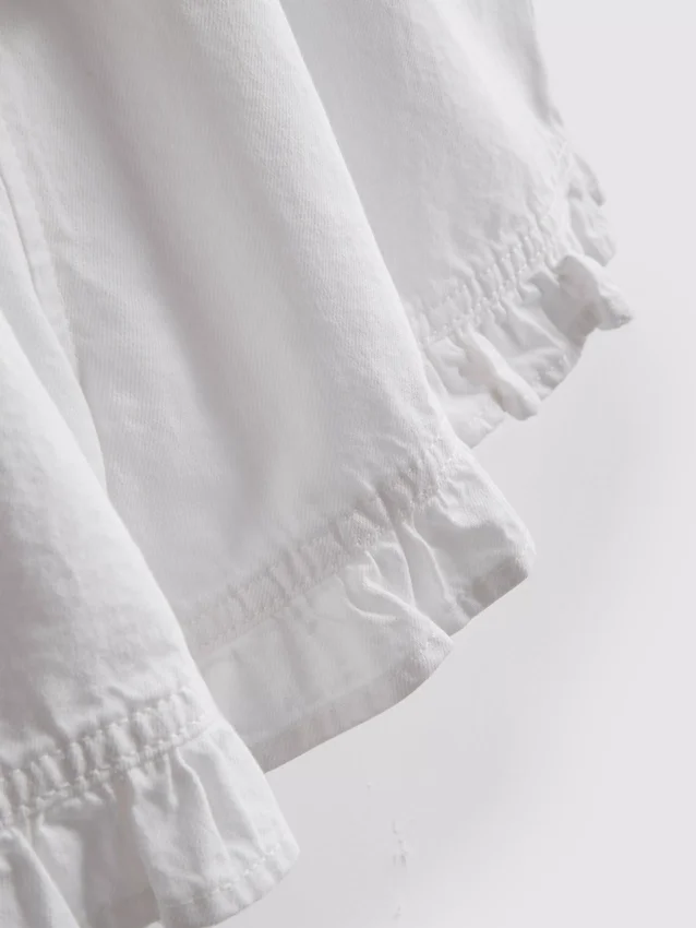 Denimshorts med volanger nederst