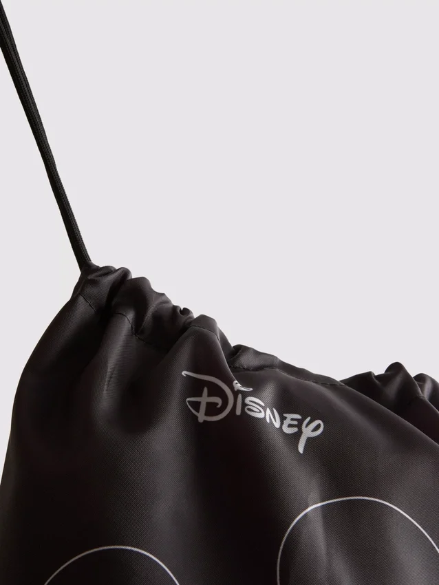 Disneys Mickey Mouse-grafikk med snøring på vesken