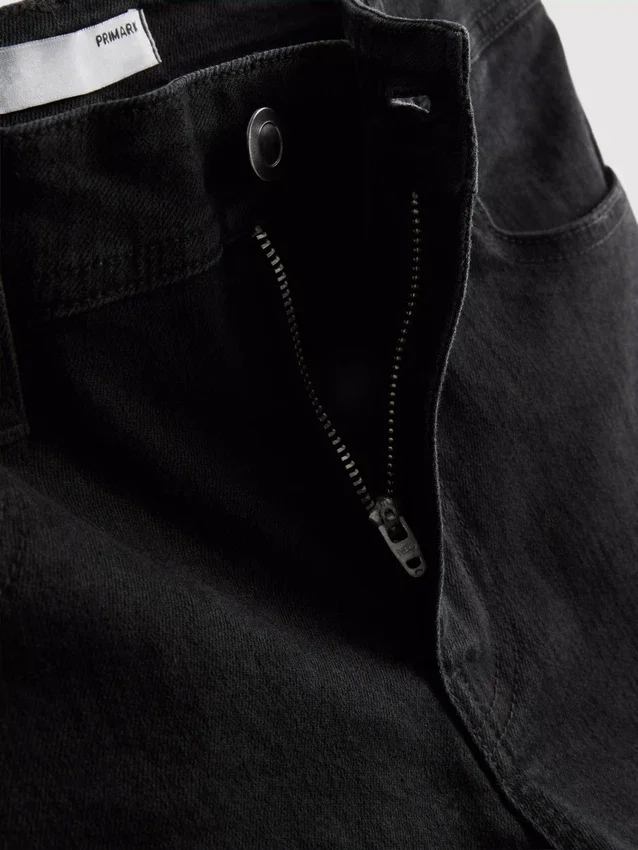 Flared-jeans i bomullsdenim med middels høy midje
