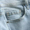 Flared-jeans i bomullsdenim med middels høy midje