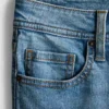 Flared-jeans i bomullsdenim med middels høy midje