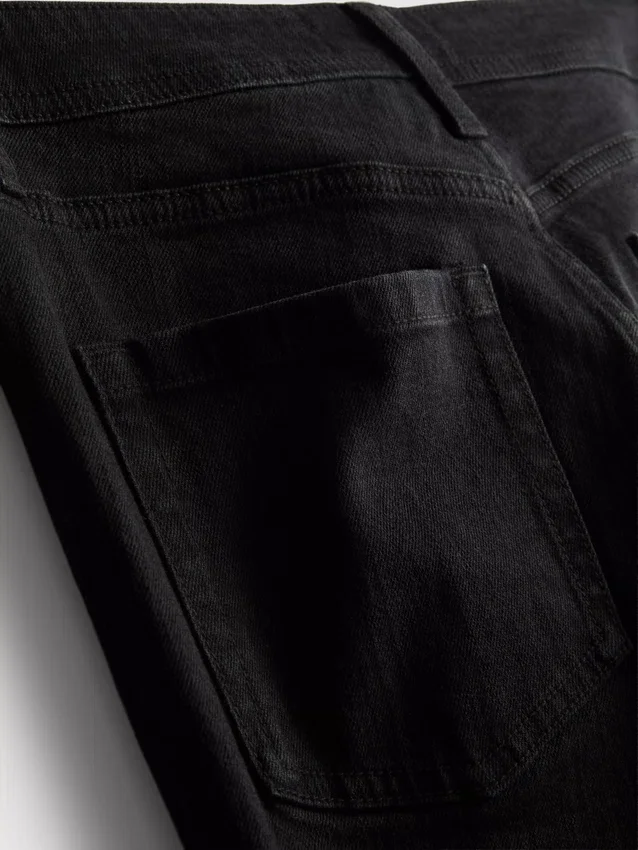 Flared-jeans i bomullsdenim med middels høy midje