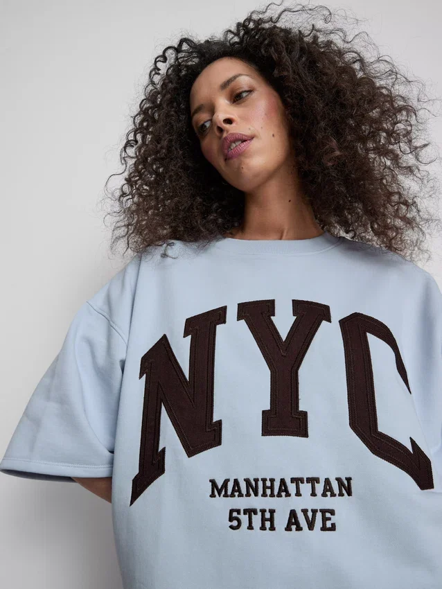 Gensere med drop-ermer i bomullsrik NYC-stil