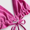 Glitrende trekantet bikinitopp med volanger