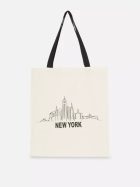 Grafisk totebag i bomull med bymotiv