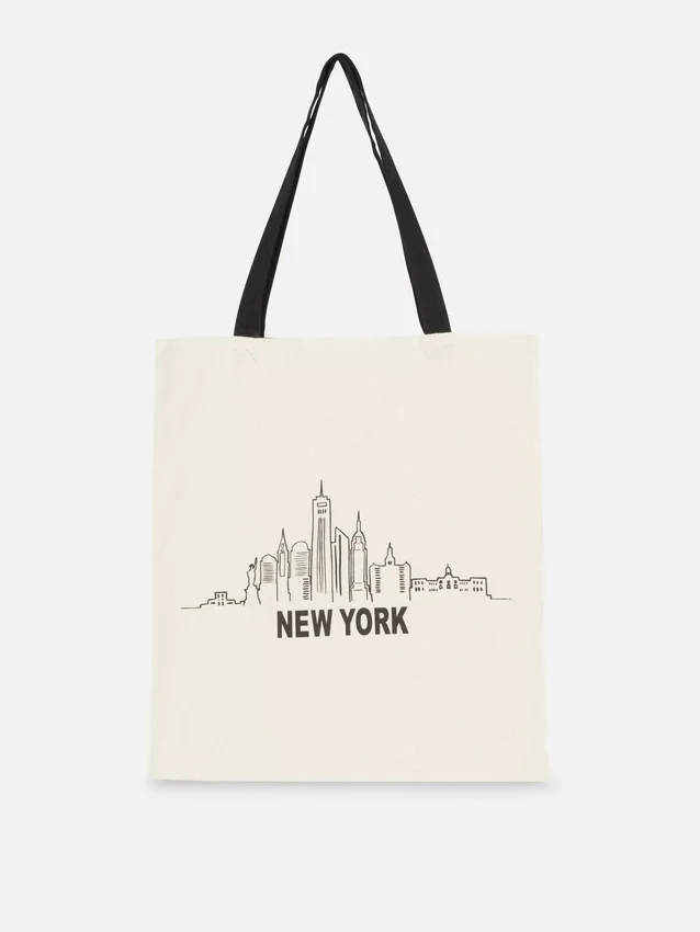 Grafisk totebag i bomull med bymotiv