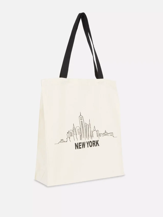 Grafisk totebag i bomull med bymotiv