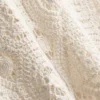 Heklet topp med bånd i siden