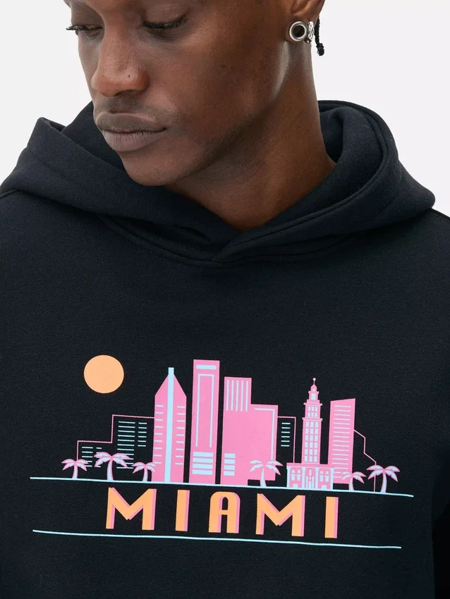 Hettegenser med Miami-skyline