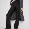 Jeans i bomull med middels høy midje og bootcut-passform
