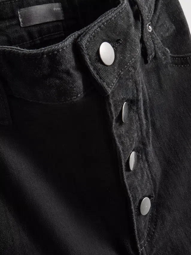 Jeans i bomull med middels høy midje og bootcut-passform