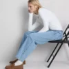 Jeans i bomullsdenim med høy midje og smalere ben