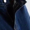 Jeans i bomullsdenim med høy midje og smalere ben