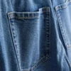 Jeans i bomullsdenim med høy midje og smalere ben