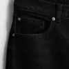 Jeans i bomullsdenim med høy midje og smalere ben