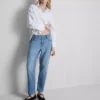 Jeans i bomullsdenim med middels høy midje og rette ben