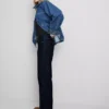 Jeans i bomullsdenim med middels høy midje og rette ben
