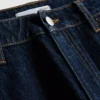Jeans i bomullsdenim med middels høy midje og rette ben