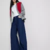 Jeans i bomullsdenim med middels høy midje og vide ben
