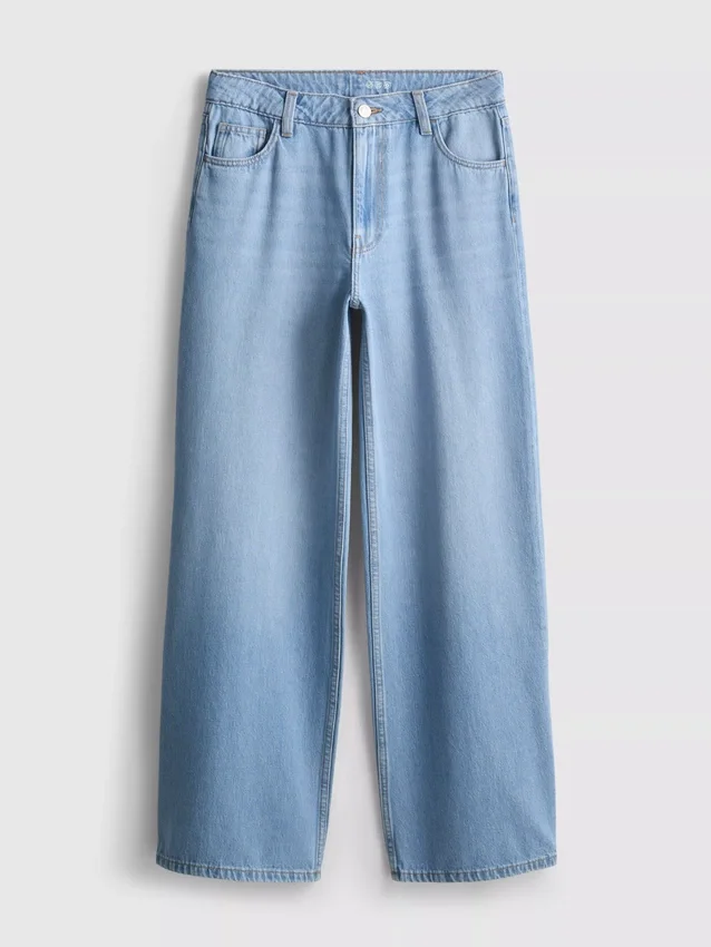 Jeans i bomullsdenim med middels høy midje og vide ben
