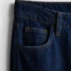 Jeans i bomullsdenim med middels høy midje og vide ben