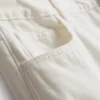 Jeans i bomullsdenim med middels høy midje og vide ben
