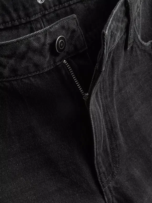 Jeans i bomullsdenim med middels høy midje og vide ben