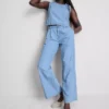 Jeans i bomullsdenim med plissert, vid ben