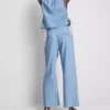 Jeans i bomullsdenim med plissert, vid ben