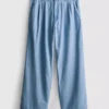 Jeans i bomullsdenim med plissert, vid ben