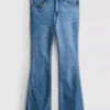 Jeans i bomullsdenim med vid ben og middels høy midje