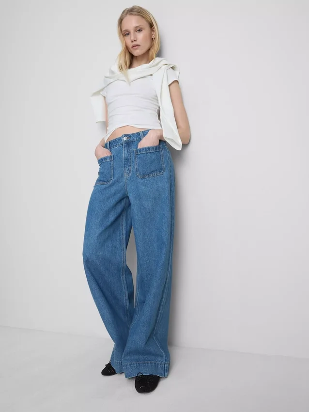 Jeans med brede ben og lommer foran