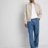 Jeans med middels høy midje og avslappet passform