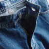 Jeans med middels høy midje og avslappet passform