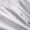 Jersey-shorts med knapper, med høyt bomullsinnhold