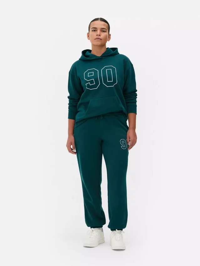 Joggebukse med mansjetter og trykk