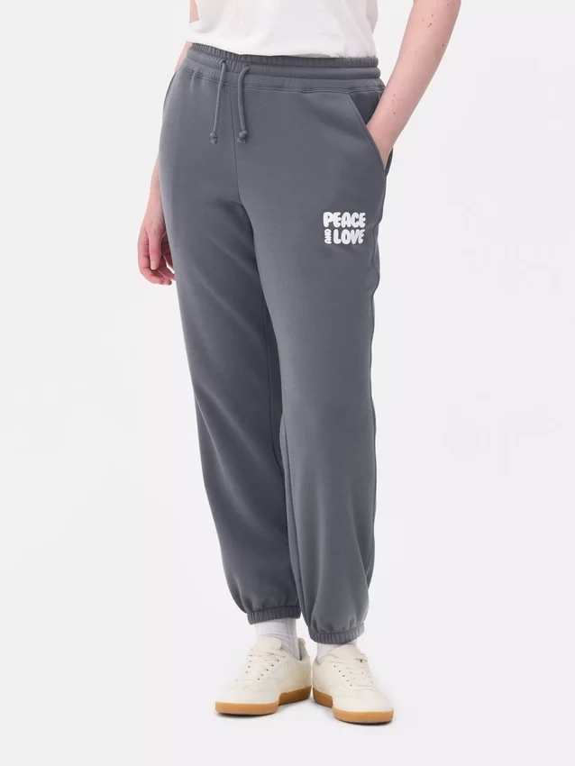 Joggebukse med mansjetter og trykk