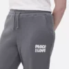 Joggebukse med mansjetter og trykk