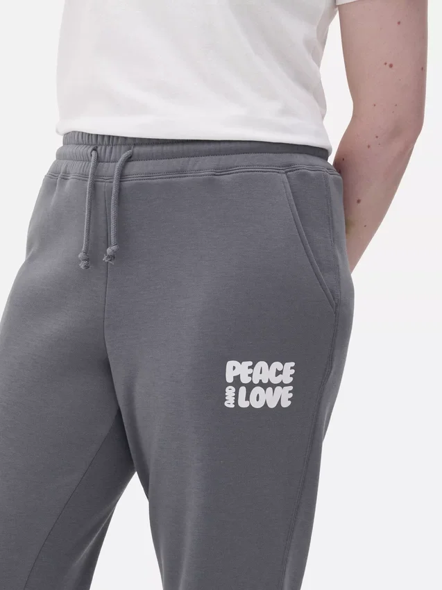 Joggebukse med mansjetter og trykk
