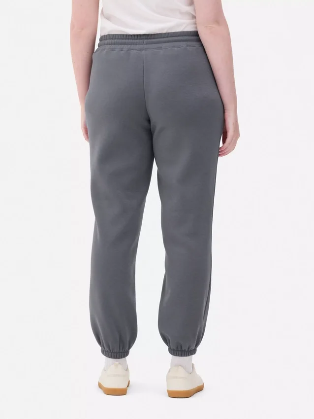 Joggebukse med mansjetter og trykk