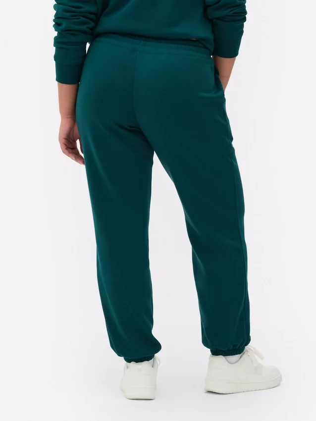 Joggebukse med mansjetter og trykk
