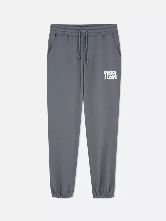 Joggebukse med mansjetter og trykk