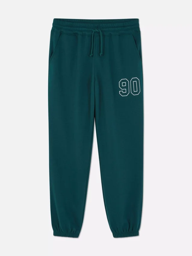 Joggebukse med mansjetter og trykk