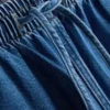 Joggebukser i bomullsdenim med avsmalnende ben