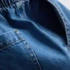 Joggebukser i bomullsdenim med avsmalnende ben