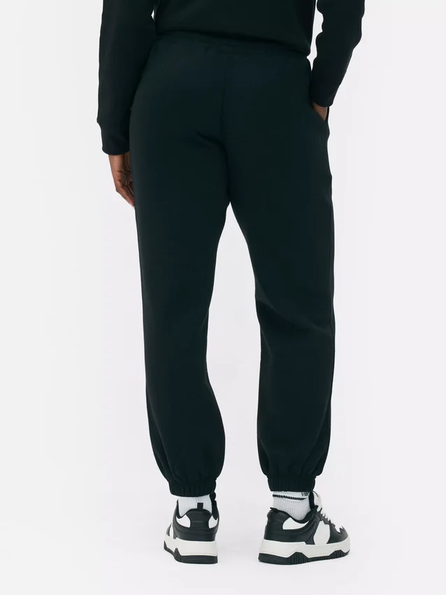 Joggebukser med mansjetter og snøring i benet