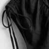 Jumpsuit med V-hals og ballongben