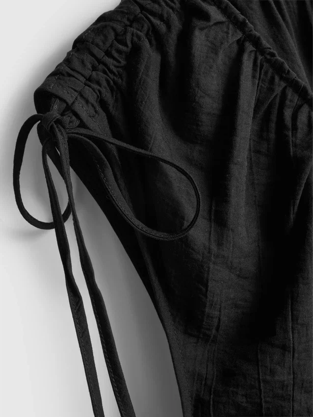 Jumpsuit med V-hals og ballongben