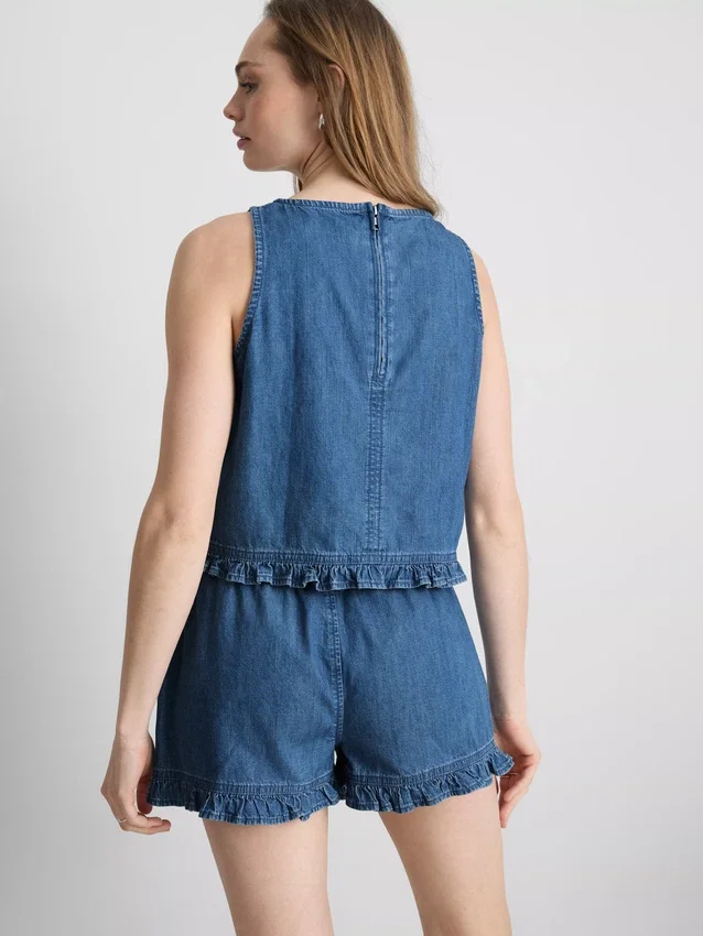 Kort topp i bomullsdenim med volanger