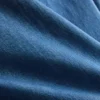 Kort topp i bomullsdenim med volanger